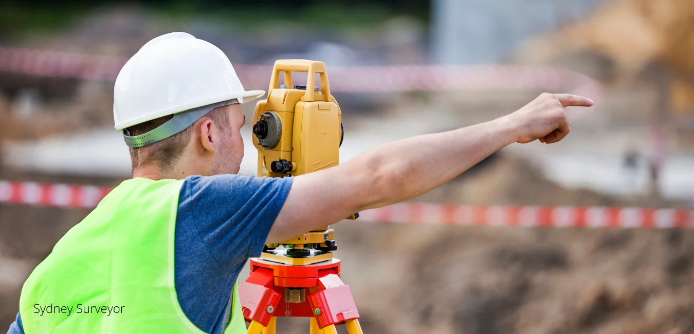 Land surveyor Sydney marking property boundaries with GPS equipment